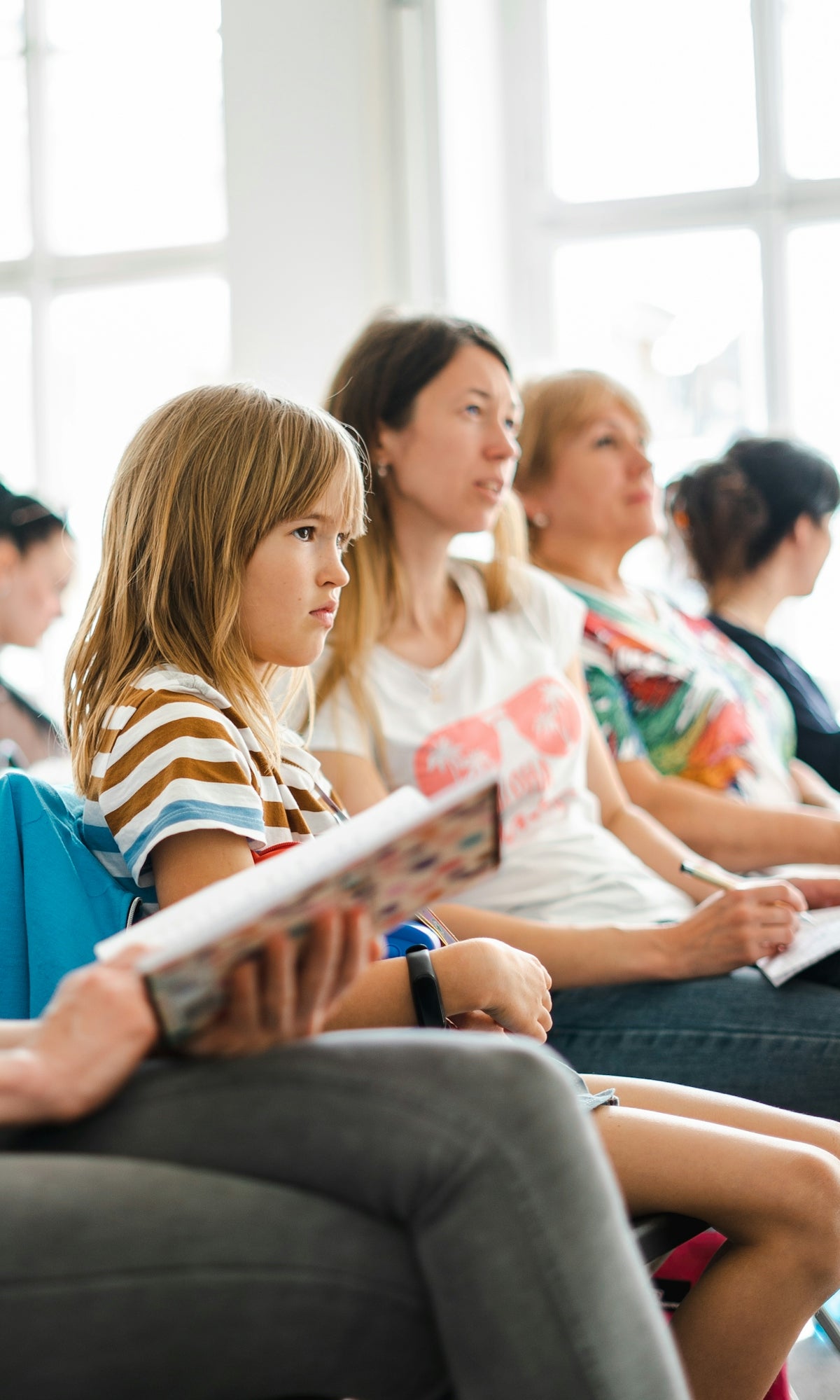a group of students sitting in a classroom